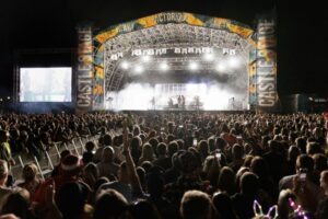 The crowd looking at Bastille on the Castle Stage at Victorious Festival.