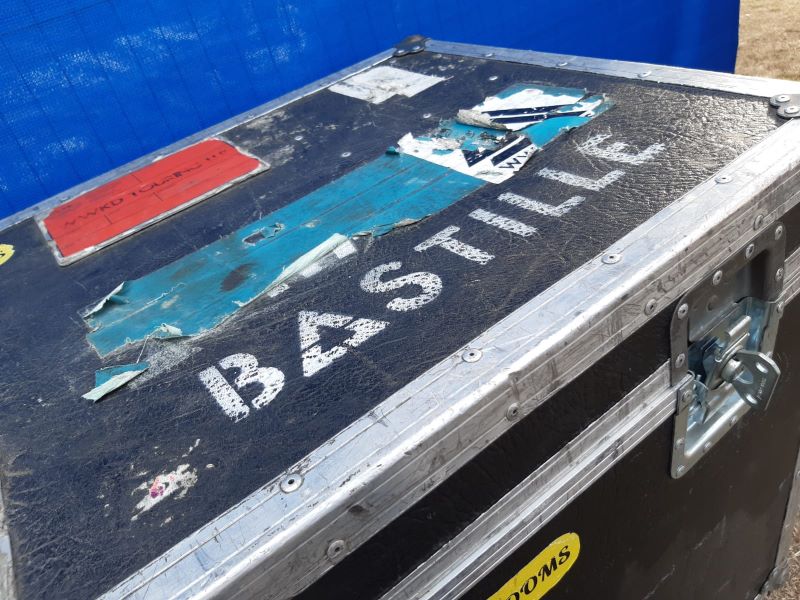 Large kit box with Bastille written across the top in stylised font, backstage at Victorious Festival.