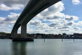 Itchen Bridge stretching over the river, shot from below.