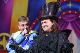 Jason Donovan as Count Ramsay of Erinsborough and Richard Cadelll as Joey the Clown on stage.