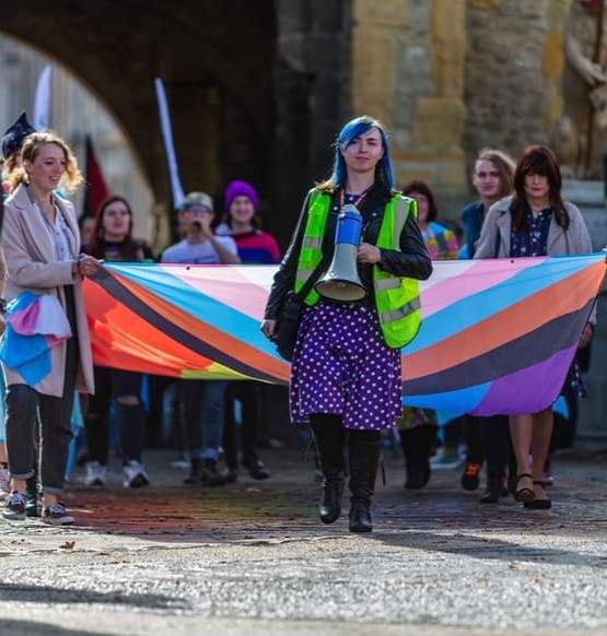 Mabel with megaphone at Transgender Pride march.